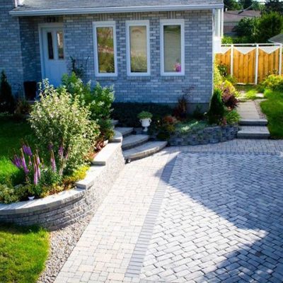 Réalisation DRAINSPEC muret rocaille entrée et stationnement